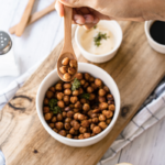 This recipe for Crunchy Chickpeas is a delicious and satisfying snack that is full of protein and fiber, with a rich, smoky flavor and a tangy finish from the lemon juice.