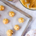 Close-up of banana pudding cookies with white chocolate chips and a light, fluffy texture.