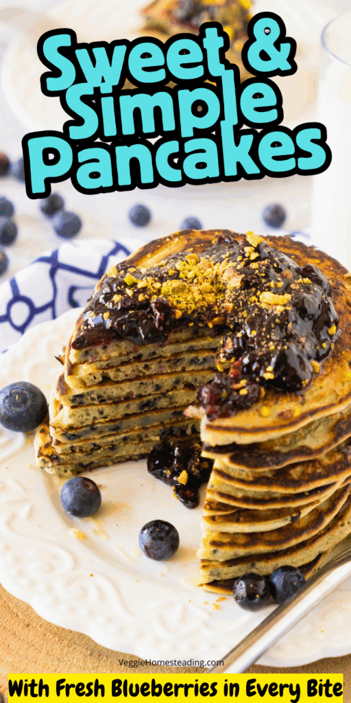 Stack of fluffy gluten-free blueberry pancakes topped with syrup and fresh blueberries