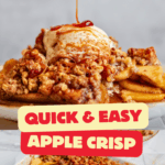 Warm apple crisp topped with a scoop of vanilla ice cream and caramel drizzle.