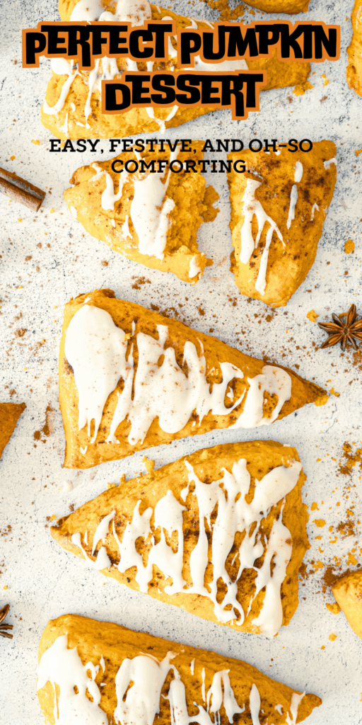 Homemade pumpkin scones with warm spices and sweet glaze cooling on a wire rack.